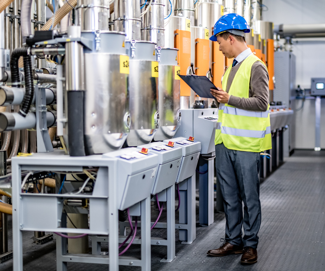 Equipment, Vehicles & Machinery Engineer inspecting industrial equipment