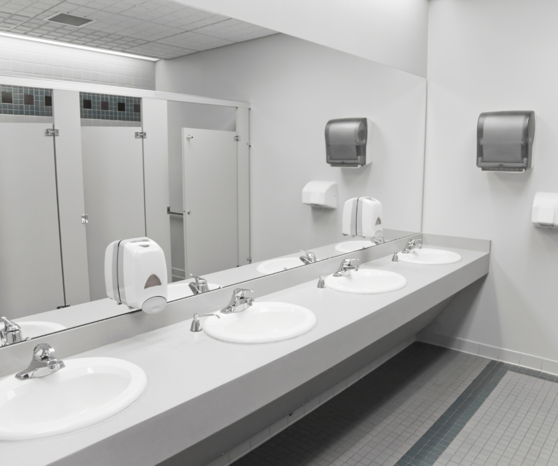 Commercial washroom with basins and fixtures