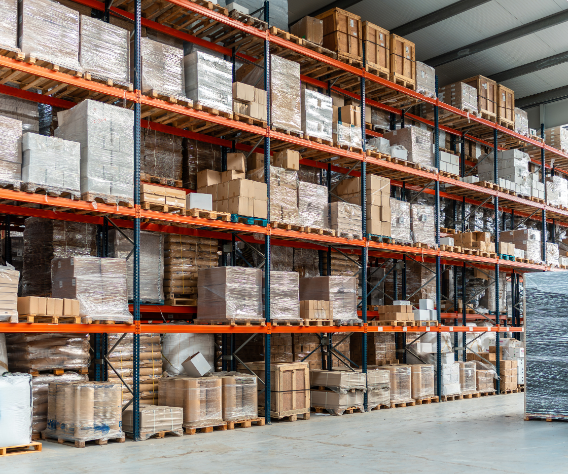 Warehouse racking stocked with palletised supplies